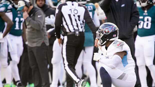 Tennessee Titans linebacker David Long Jr. (51) kneels on the ground with an injury during the second quarter at Lincoln Financial Field Sunday, Dec. 4, 2022, in Philadelphia, Pa.